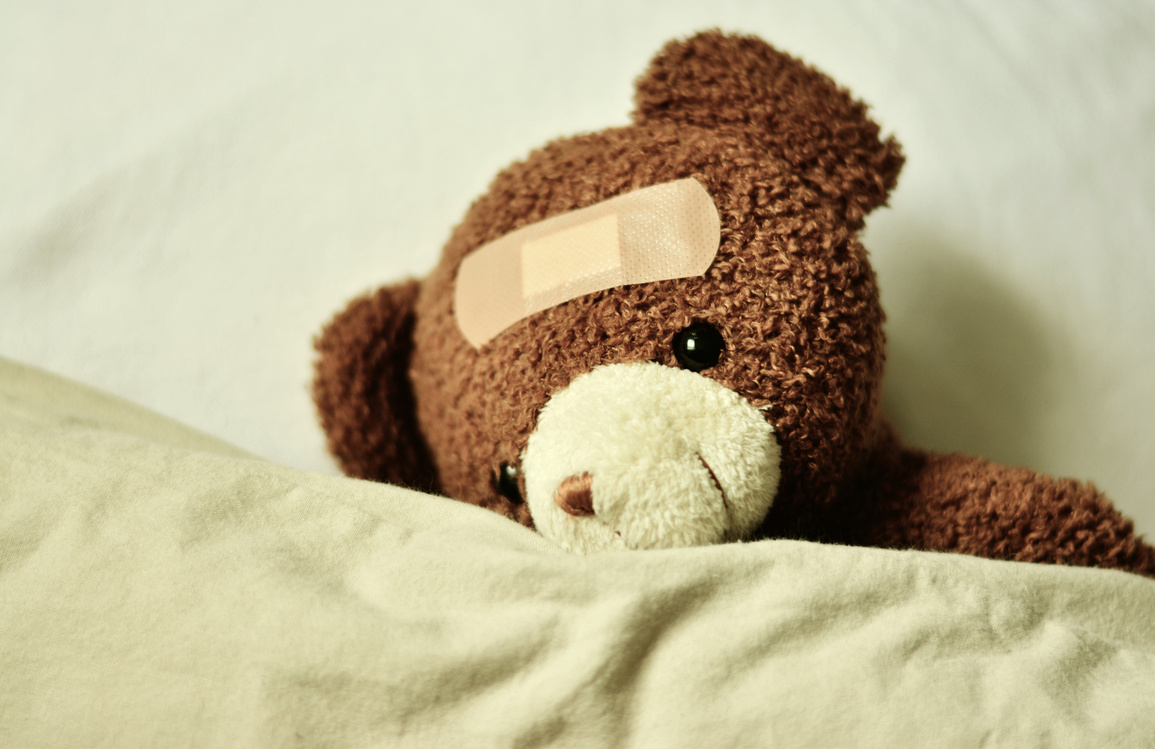 Cute Teddy Bear with a Bandage